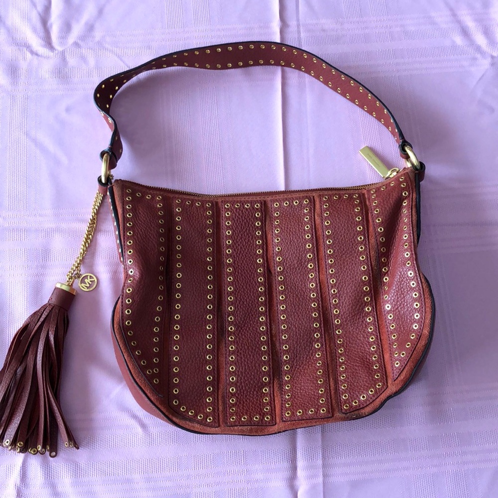 Michael Kors medium size rust/brown handbag